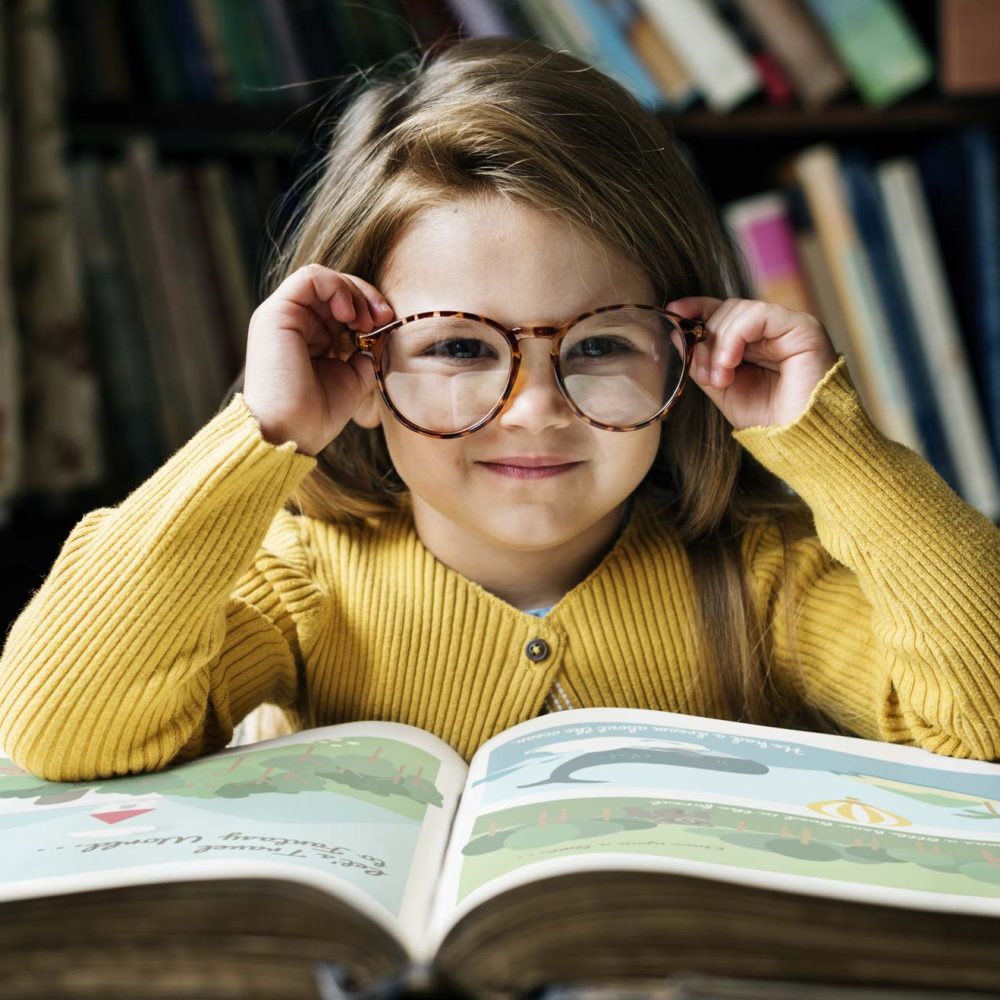 adorable-cute-girl-reading-storytelling-concept